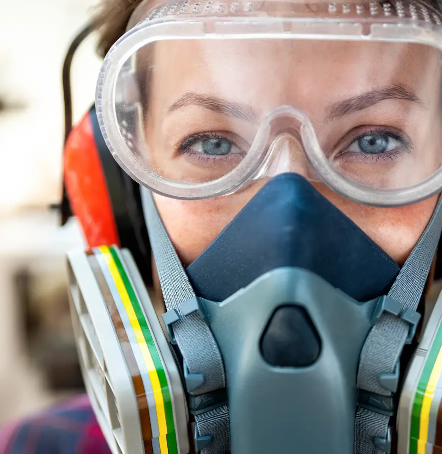 Close up of woman worker with protective gear