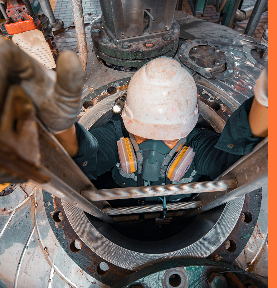 Worker climbing up ladder