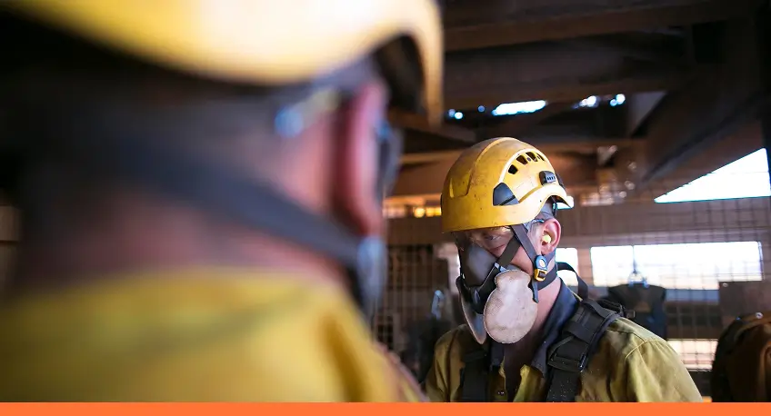 Equipped asbestos workers.