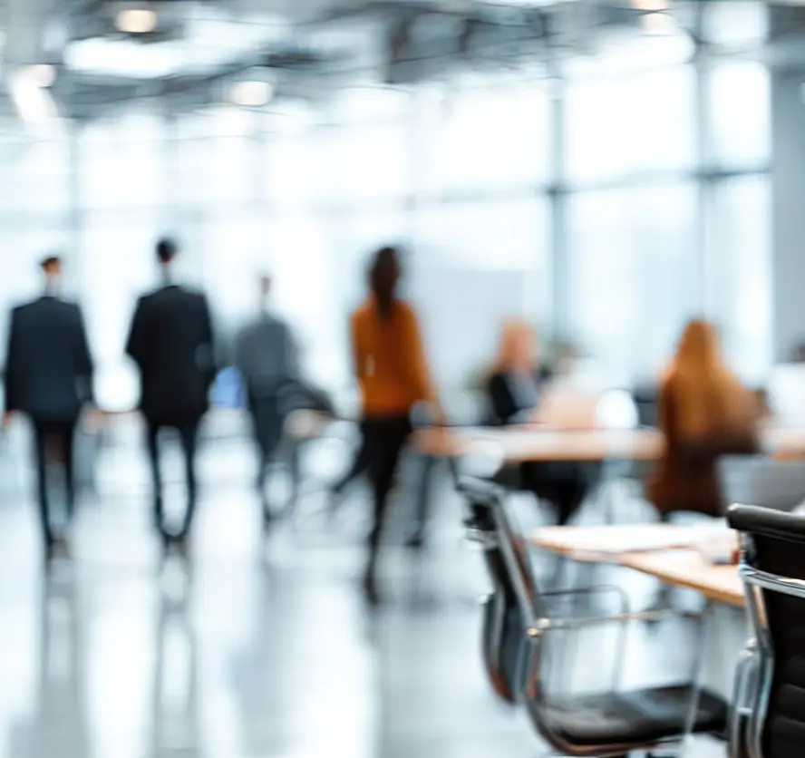 out of focus office workers in the background
