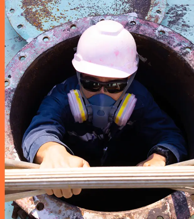 worker climbing up ladder